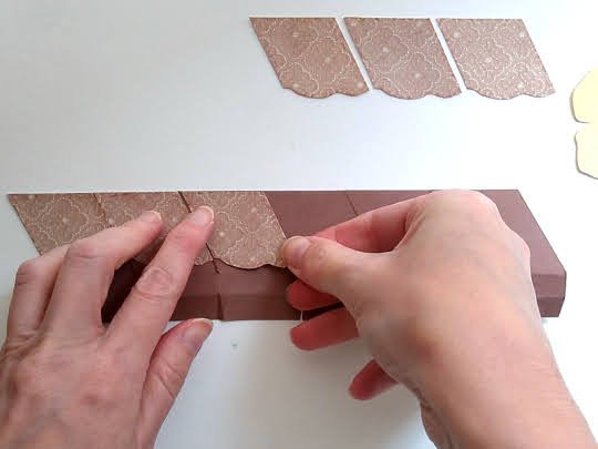 Adding textured icing panels to a cupcake favour box