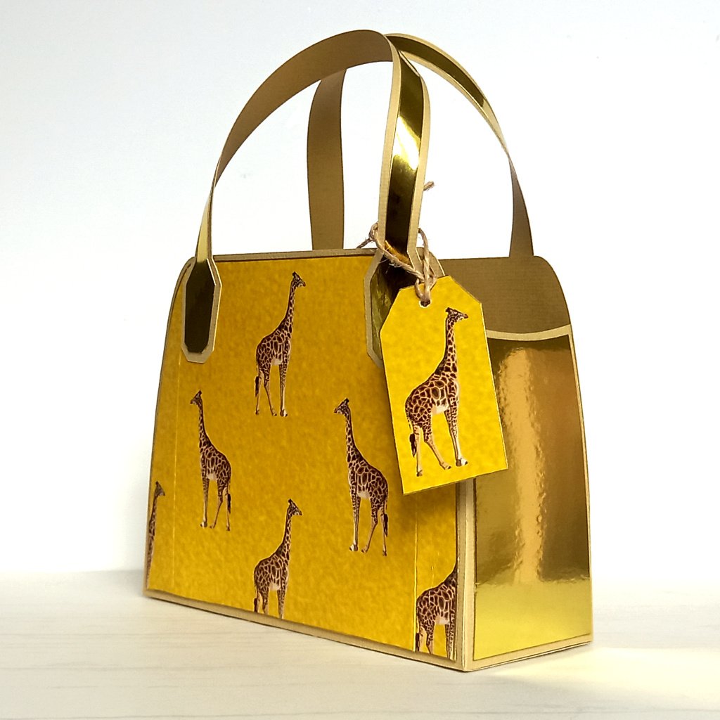 Yellow upcycled favour bag with giraffe design