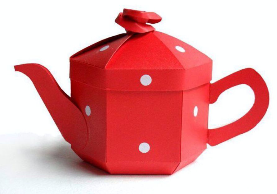 A red papercraft teapot gift box decorated with white paper spots