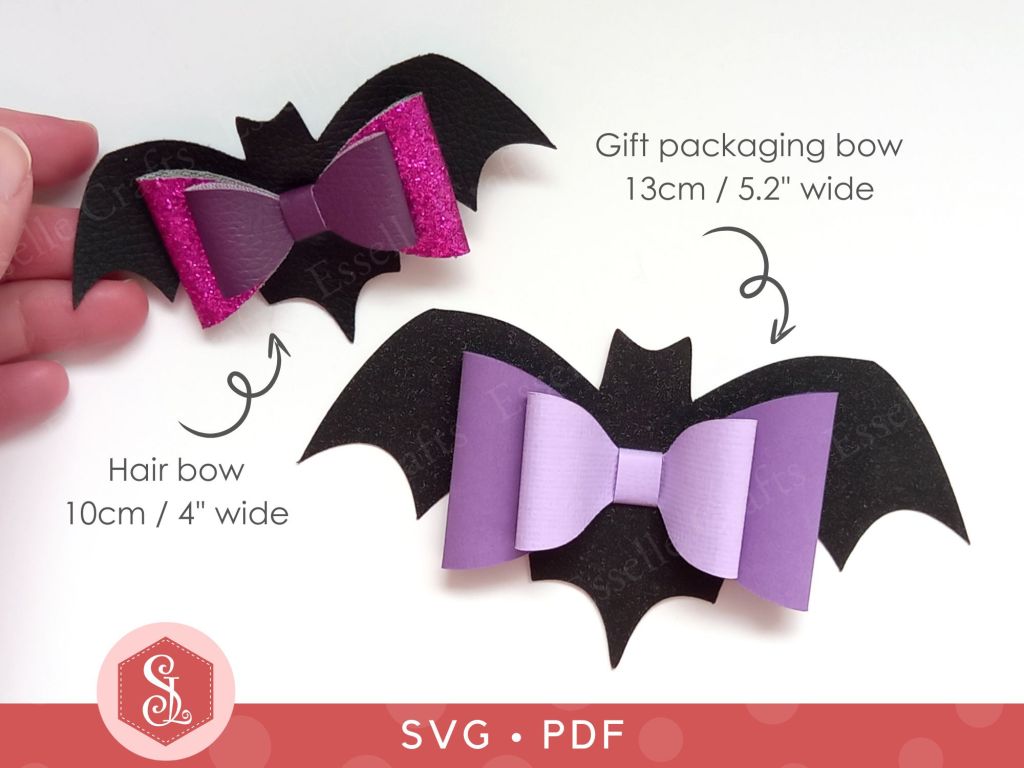 Two black and purple bat bows one made from faux leather and thin glitter fabric that can be used as a Halloween hair bow or a brooch and one made from cardstock that can be used on Halloween gift packaging or home decor