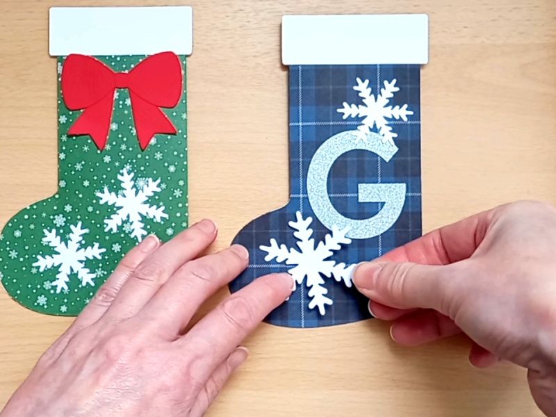 Making a festive paper craft gift card holder in the shape of a Christmas stocking