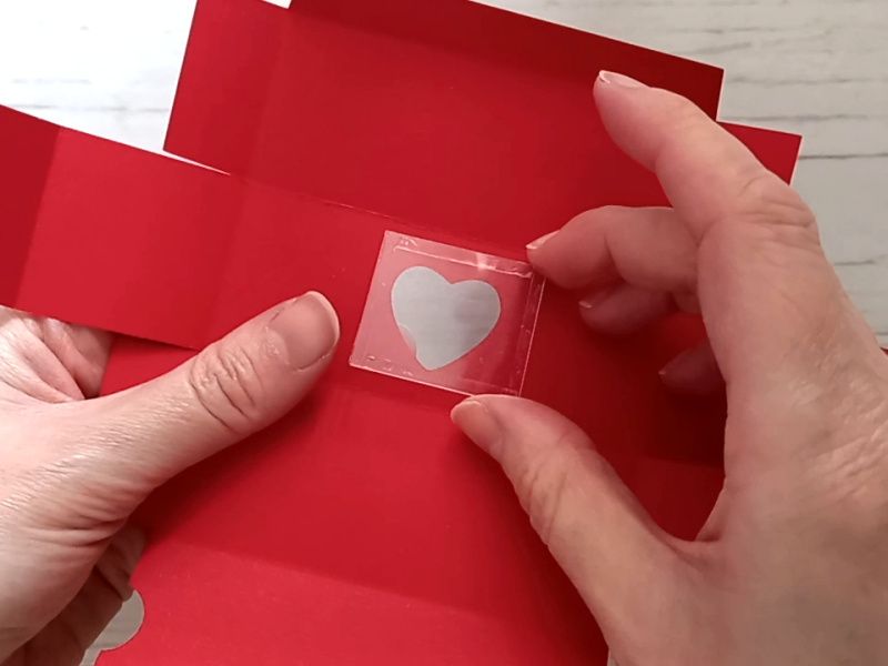 A red papercraft treat box for Valentine's day