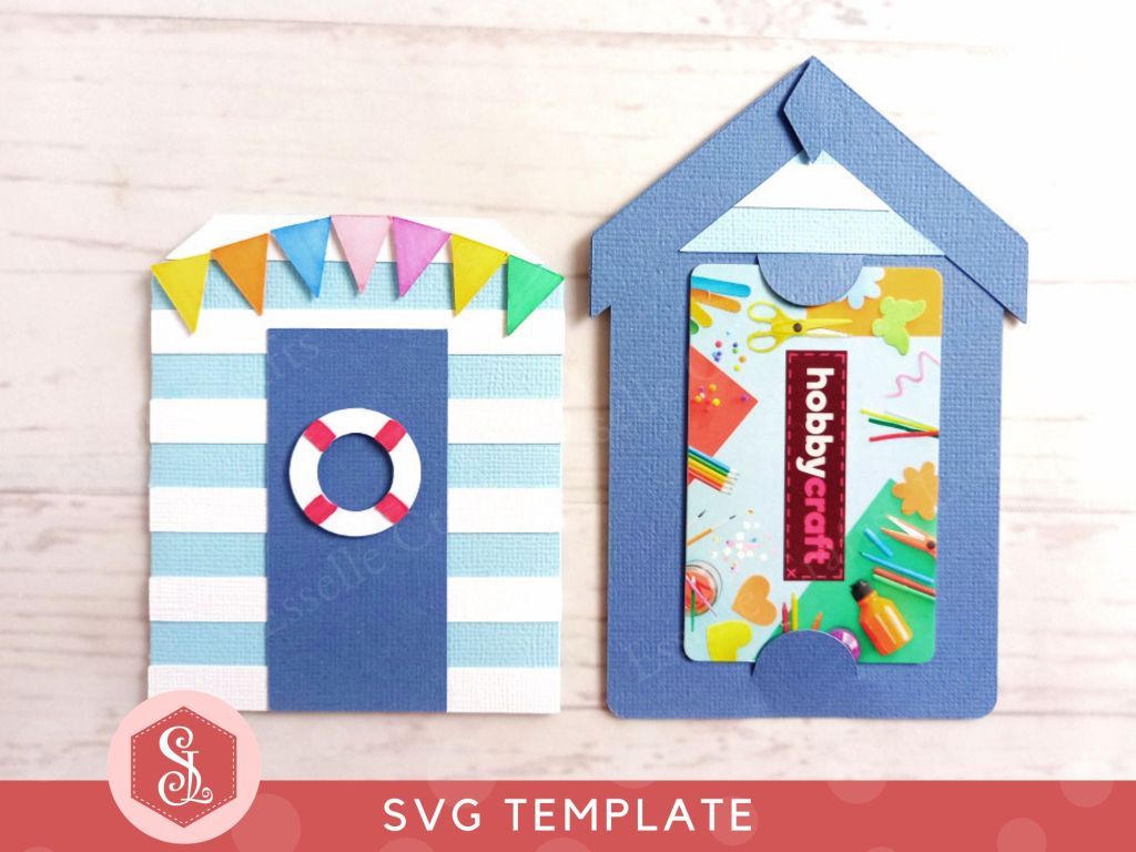 A papercraft gift card holder in the style of a beach hut, decorated with blue and white stripes, a red and white lifebuoy and colourful paper bunting.