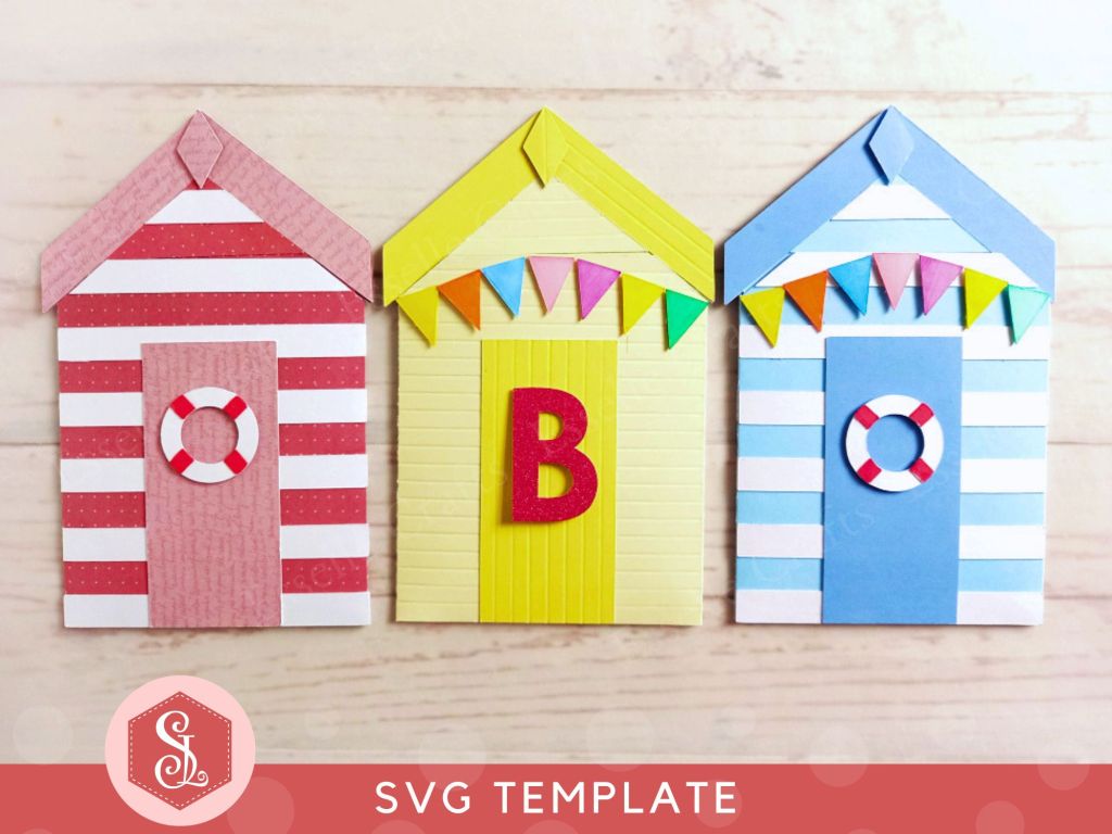 Three papercraft gift card holders in the style of beach huts, each decorated with blue and white stripes, a red and white lifebuoy and colourful paper bunting.