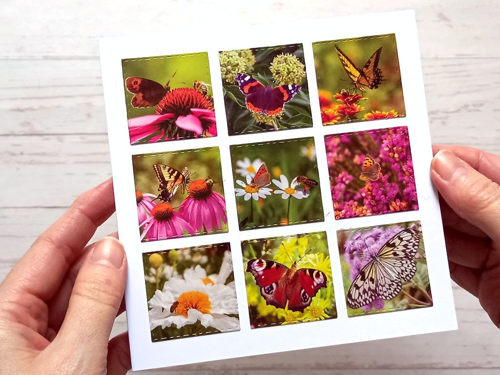 A handmade butterflies and bees greeting card made from upcycled wall calendar images.