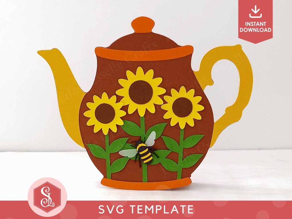 A papercraft gift card holder in the style of a vintage brown teapot with a yellow handle and spout. It is decorated with three paper sunflowers and a paper bee on the front.