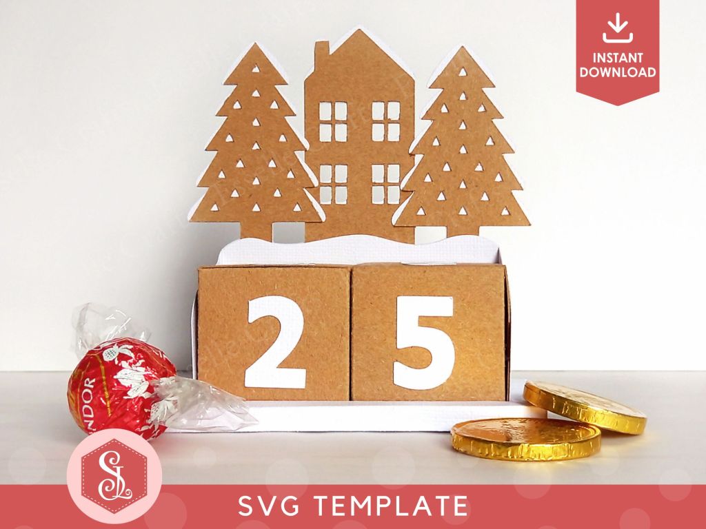 A Christmas countdown advent calendar, which comes as a DIY papercraft template, featuring a central house, two pine trees, and two numbered blocks that double up as gift boxes. It can be refilled and reused each year.